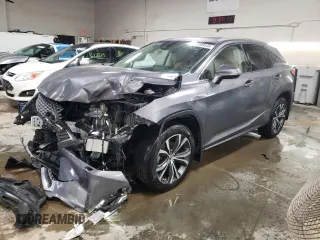 2021 Lexus RX with VIN 2T2HZMDAXMC307489, listed as a Copart auction lot 52098545 with 53,695 mi miles and Salvage Title. Bid and sale history available at carsss.com. Image 1.