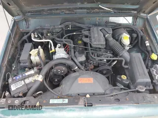 2000 Jeep Cherokee SE z VIN 1J4FT27P0YL185249, wystawiony jako IAAI lot #42650722 z przebiegiem 129 092 mil mil oraz . Historia ofert i sprzedaży dostępna na DreamBid. Obrazek 10.