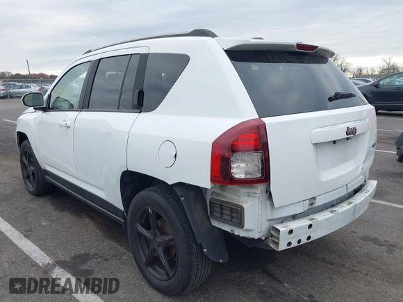 2016 Jeep Compass Latitude with VIN 1C4NJCEA3GD735161, listed as a IAAI auction lot 40881008 with 126,384 mi miles. Bid and sale history available at carsss.com. Image 3.
