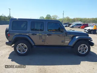 2018 Jeep Wrangler Unlimited Sahara with VIN 1C4HJXEG0JW166645, listed as a IAAI auction lot 42228492 with 58,416 mi miles and . Bid and sale history available at DreamBid. Image 14.