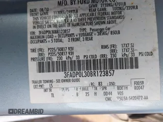 2011 Ford Fusion Hybrid z VIN 3FADP0L30BR123857, wystawiony jako IAAI lot #42534556 z przebiegiem 144 811 mil mil oraz . Historia ofert i sprzedaży dostępna na DreamBid. Obrazek 9.
