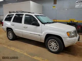 2004 Jeep Grand Cherokee Limited with VIN 1J4GW58N34C387393, listed as a Copart auction lot 41846405 with 160,606 mi miles and Salvage Title. Bid and sale history available at carsss.com. Image 4.