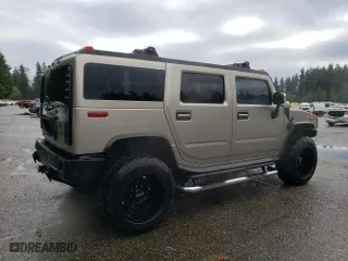 2003 Hummer H2 with VIN 5GRGN23U73H111109, listed as a Copart auction lot 76388144 with 160,179 mi miles and Salvage Title. Bid and sale history available at carsss.com. Image 3.
