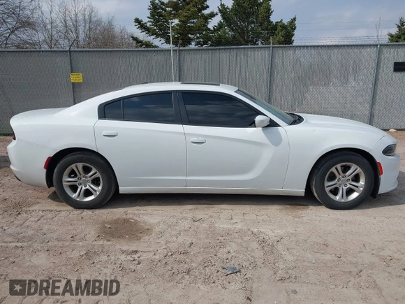 2020 Dodge Charger SXT z VIN 2C3CDXBG4LH213896, wystawiony jako IAAI lot #42143333 z przebiegiem 76 592 mil mil oraz . Historia ofert i sprzedaży dostępna na DreamBid. Obrazek 14.
