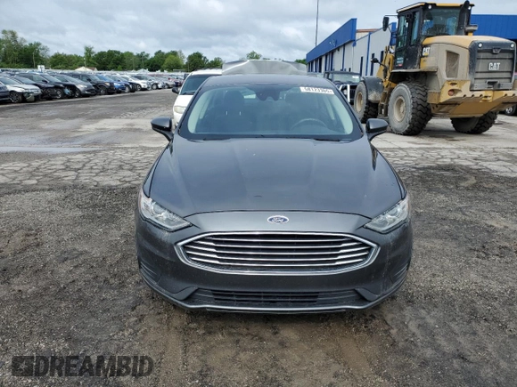 2020 Ford Fusion SE z VIN 3FA6P0HD1LR252332, wystawiony jako Copart lot #58123365 z przebiegiem 76 410 mil mil oraz Szkoda całkowita • Salvage title. Historia ofert i sprzedaży dostępna na DreamBid. Obrazek 5.