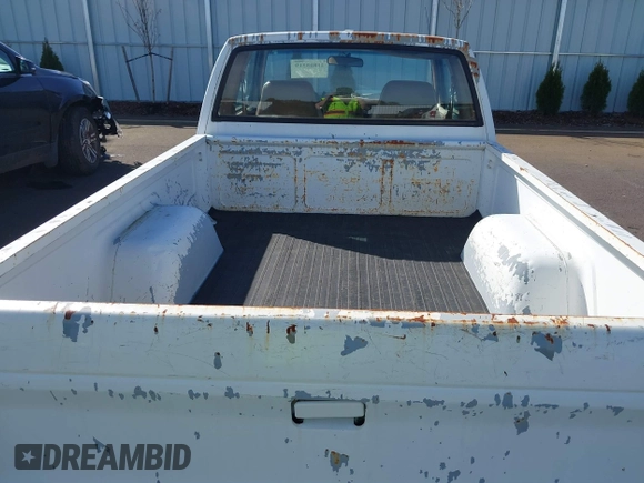 1991 GMC Sonoma z VIN 1GTCS19Z4M8505710, wystawiony jako IAAI lot #41865519 z przebiegiem 112 290 mil mil oraz . Historia ofert i sprzedaży dostępna na DreamBid. Obrazek 6.