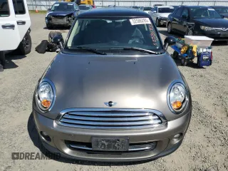 2013 MINI Hardtop with VIN WMWSU3C57DT678736, listed as a Copart auction lot 52586285 with 64,563 mi miles and Salvage Title. Bid and sale history available at DreamBid. Image 5.