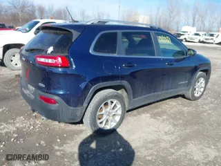 2014 Jeep Cherokee Latitude with VIN 1C4PJMCS6EW145810, listed as a IAAI auction lot 41802031 with 143,358 mi miles. Bid and sale history available at carsss.com. Image 4.