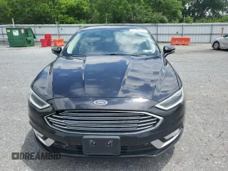 2017 Ford Fusion Titanium z VIN 3FA6P0K92HR192881, wystawiony jako Copart lot #61190515 z przebiegiem 109 834 mil mil oraz Szkoda całkowita • Salvage title. Historia ofert i sprzedaży dostępna na DreamBid. Obrazek 5.