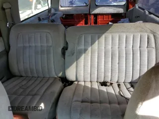 1994 GMC Suburban z VIN 1GKFK16K0RJ751324, wystawiony jako Copart lot #77827404 z przebiegiem 219 786 mil mil oraz Szkoda całkowita • Salvage title. Historia ofert i sprzedaży dostępna na DreamBid. Obrazek 10.