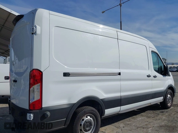 2023 Ford Transit Cargo with VIN 1FTBR1C85PKC08945, listed as a IAAI auction lot 41385685 with 5,577 mi miles and . Bid and sale history available at DreamBid. Image 4.