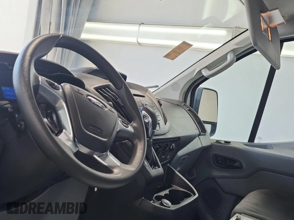 2018 Ford Transit with VIN 1FTYE1YM9JKB52270, listed as a IAAI auction lot 42714304 with 95,416 mi miles and . Bid and sale history available at DreamBid. Image 19.