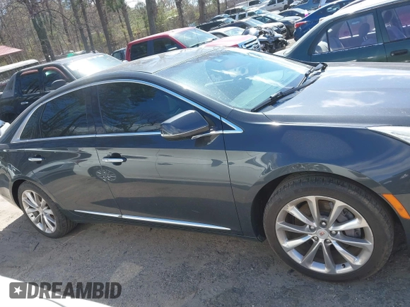 2013 Cadillac XTS Premium with VIN 2G61S5S33D9113653, listed as a IAAI auction lot 41837117 with 101,049 mi miles and . Bid and sale history available at DreamBid. Image 12.