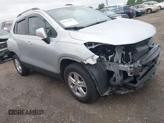 2021 Chevrolet Trax LT z VIN KL7CJPSM9MB362368, wystawiony jako IAAI lot #42312481 z przebiegiem 33 124 mil mil oraz . Historia ofert i sprzedaży dostępna na DreamBid. Obrazek 1.