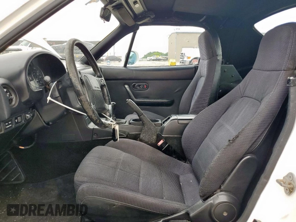 1993 Mazda MX-5 Miata with VIN JM1NA3514P1415302, listed as a Copart auction lot 59605875 with 156,881 mi miles and Salvage title. Bid and sale history available at DreamBid. Image 7.