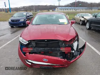2014 Ford Fusion SE Hybrid with VIN 3FA6P0LU6ER315743, listed as a IAAI auction lot 41212111 with 83,433 mi miles. Bid and sale history available at carsss.com. Image 13.