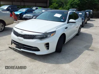 2016 Kia Optima SXL Turbo with VIN 5XXGV4L26GG015874, listed as a IAAI auction lot 42127366 with 166,970 mi miles. Bid and sale history available at carsss.com. Image 17.
