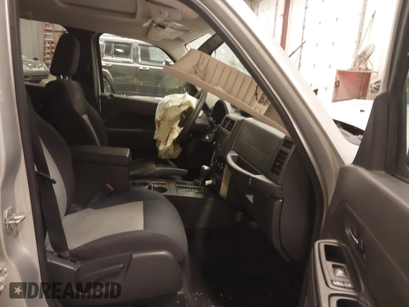 2009 Jeep Liberty Sport with VIN 1J8GN28K09W552232, listed as a IAAI auction lot 41306465 with 158,293 mi miles and . Bid and sale history available at DreamBid. Image 5.