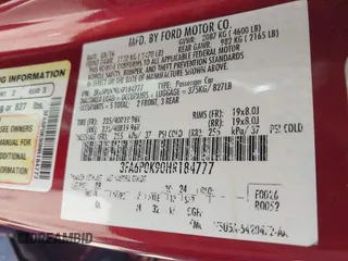 2017 Ford Fusion Titanium with VIN 3FA6P0K90HR184777, listed as a IAAI auction lot 41722188 with 116,654 mi miles. Bid and sale history available at carsss.com. Image 9.