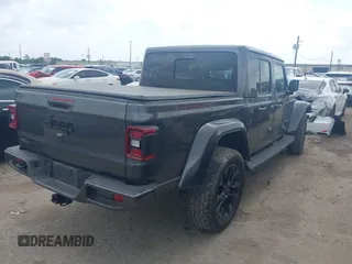 2021 Jeep Gladiator Overland with VIN 1C6HJTFG4ML617175, listed as a IAAI auction lot 42148031 with 70,627 mi miles and . Bid and sale history available at DreamBid. Image 4.