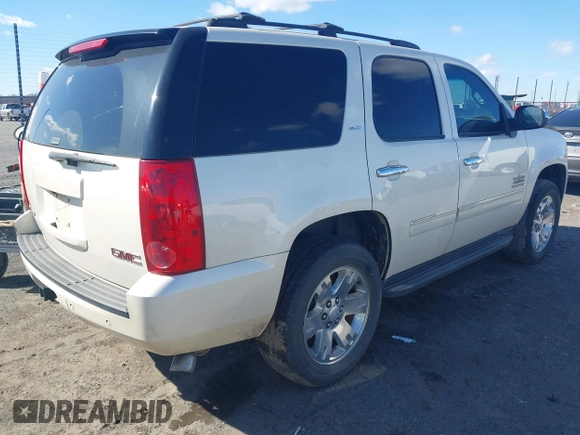 2014 GMC Yukon SLT with VIN 1GKS1CE01ER179379, listed as a IAAI auction lot 41717271 with 136,999 mi miles. Bid and sale history available at carsss.com. Image 4.