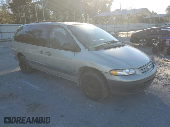 1999 Plymouth Voyager Grand SE z VIN 2P4GP44G3XR431744, wystawiony jako Copart lot #87659415 z przebiegiem Nie podano mil oraz Szkody całkowita. Historia ofert i sprzedaży dostępna na DreamBid. Obrazek 4.