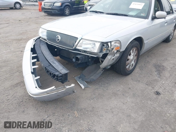 2003 Mercury Grand Marquis LS Premium z VIN 2MEFM75W03X658118, wystawiony jako IAAI lot #42435812 z przebiegiem 174 893 mil mil oraz . Historia ofert i sprzedaży dostępna na DreamBid. Obrazek 6.