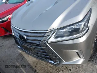 2021 Lexus LX 570 z VIN JTJDY7AX9M4335171, wystawiony jako IAAI lot #41754348 z przebiegiem 32 119 mil mil oraz . Historia ofert i sprzedaży dostępna na DreamBid. Obrazek 12.