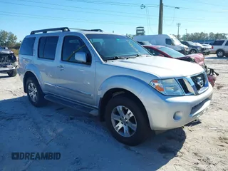 2012 Nissan Pathfinder SV z VIN 5N1AR1NB9CC635808, wystawiony jako IAAI lot #41290263 z przebiegiem 165 449 mil mil oraz . Historia ofert i sprzedaży dostępna na DreamBid. Obrazek 1.