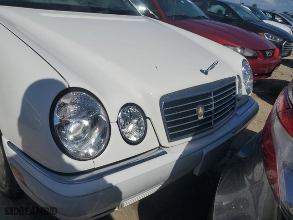 1996 Mercedes-Benz E Class with VIN WDBJF20F1TJ019480, listed as a Copart auction lot 76764114 with 0 mi miles and Salvage Title. Bid and sale history available at carsss.com. Image 5.