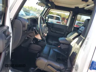2012 Jeep Wrangler Unlimited Altitude with VIN 1C4HJWEG4CL285314, listed as a Copart auction lot 54494955 with 137,011 mi miles and Salvage title. Bid and sale history available at DreamBid. Image 7.