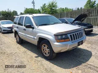 2004 Jeep Grand Cherokee Laredo with VIN 1J4GW48S94C369643, listed as a IAAI auction lot 42693998 with 225,033 mi miles and . Bid and sale history available at DreamBid. Image 1.