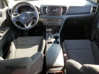 2018 Kia Sportage LX z VIN KNDPMCAC8J7330264, wystawiony jako Copart lot #61582275 z przebiegiem 93 201 mil mil oraz Czysty tytuł • Clean title. Historia ofert i sprzedaży dostępna na DreamBid. Obrazek 8.