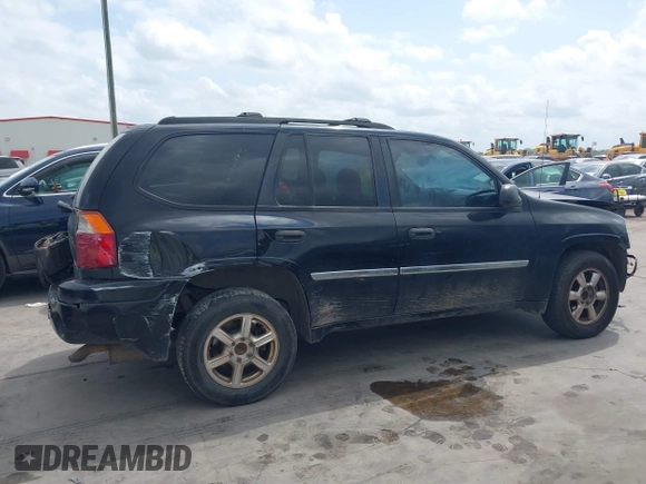 2009 GMC Envoy SLE z VIN 1GKDS33S592105035, wystawiony jako IAAI lot #42089058 z przebiegiem 249 127 mil mil oraz . Historia ofert i sprzedaży dostępna na DreamBid. Obrazek 14.