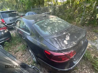 2013 Volkswagen CC Sport with VIN WVWBP7AN3DE504851, listed as a Copart auction lot 54958815 with 104,533 mi miles and Salvage Title. Bid and sale history available at carsss.com. Image 3.