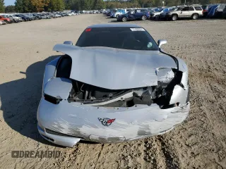 2003 Chevrolet Corvette Z06 with VIN 1G1YY12S635123754, listed as a Copart auction lot 77480804 with 56,223 mi miles and Salvage Title. Bid and sale history available at carsss.com. Image 5.