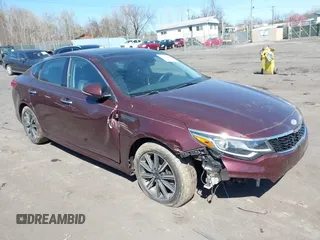 2019 Kia Optima EX with VIN 5XXGU4L12KG292041, listed as a IAAI auction lot 42065738 with 74,222 mi miles and . Bid and sale history available at carsss.com. Image 1.