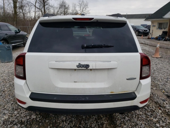 2014 Jeep Compass Latitude with VIN 1C4NJCEBXED512556, listed as a Copart auction lot 42580305 with 134,503 mi miles and Clean Title. Bid and sale history available at carsss.com. Image 6.