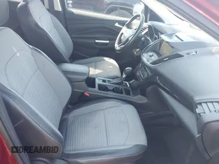 2017 Ford Escape SE z VIN 1FMCU9GD4HUA10240, wystawiony jako IAAI lot #42392522 z przebiegiem 82 325 mil mil oraz . Historia ofert i sprzedaży dostępna na DreamBid. Obrazek 5.