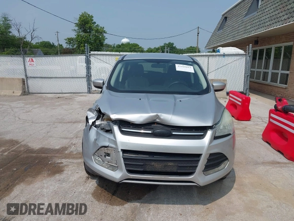 2014 Ford Escape SE with VIN 1FMCU9GX9EUD83148, listed as a IAAI auction lot 42449815 with 120,062 mi miles and . Bid and sale history available at DreamBid. Image 12.