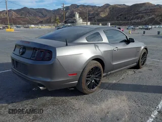 2013 Ford Mustang GT with VIN 1ZVBP8CF0D5247978, listed as a IAAI auction lot 41483581 with 111,560 mi miles. Bid and sale history available at carsss.com. Image 4.