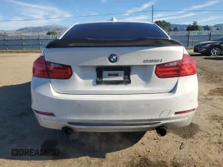 2012 BMW 3 Series 335i with VIN WBA3A9C59CF270736, listed as a Copart auction lot 87223824 with 124,700 mi miles and Salvage title. Bid and sale history available at DreamBid. Image 6.