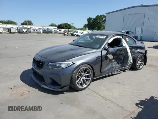 2017 BMW M2 z VIN WBS1H9C3XHV887993, wystawiony jako Copart lot #54049315 z przebiegiem Nie podano mil oraz Szkoda całkowita • Salvage title. Historia ofert i sprzedaży dostępna na DreamBid. Obrazek 1.