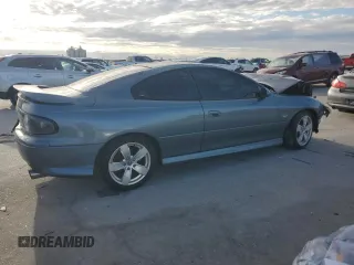2005 Pontiac GTO with VIN 6G2VX12U75L457697, listed as a Copart auction lot 84683564 with 57,504 mi miles and Salvage Title. Bid and sale history available at carsss.com. Image 3.