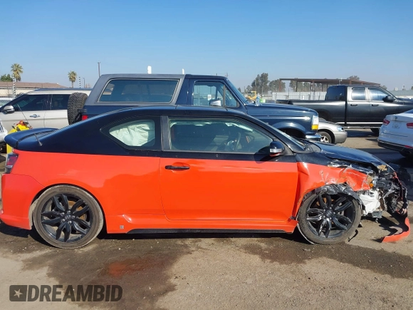2015 Scion tC with VIN JTKJF5C71FJ006863, listed as a IAAI auction lot 41332681 with 91,559 mi miles. Bid and sale history available at carsss.com. Image 14.