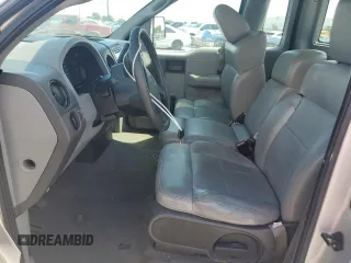 2005 Ford F-150 XL with VIN 1FTRF12225NC03167, listed as a Copart auction lot 61046445 with 153,050 mi miles and Salvage title. Bid and sale history available at DreamBid. Image 7.