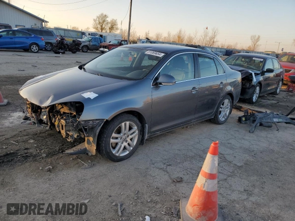 2009 Volkswagen Jetta z VIN 3VWAL71K09M133238, wystawiony jako Copart lot #81069654 z przebiegiem 153 617 mil mil oraz Szkoda całkowita • Salvage title. Historia ofert i sprzedaży dostępna na DreamBid. Obrazek 1.