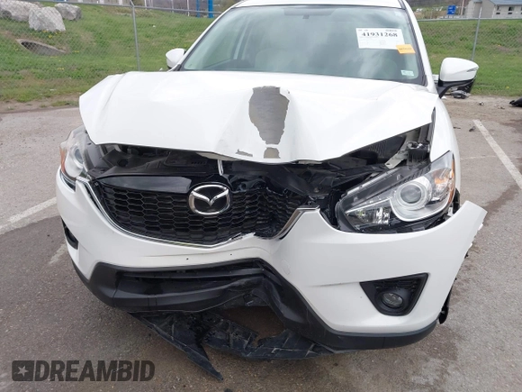 2015 Mazda CX-5 Touring with VIN JM3KE2CY3F0550624, listed as a IAAI auction lot 41931268 with 51,588 mi miles and . Bid and sale history available at carsss.com. Image 6.
