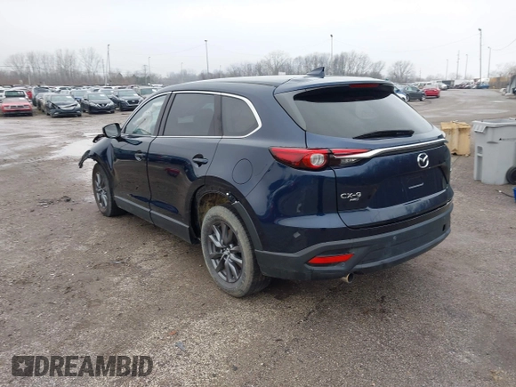 2021 Mazda CX-9 Touring z VIN JM3TCBCY4M0520362, wystawiony jako IAAI lot #41193396 z przebiegiem 17 323 mil mil oraz . Historia ofert i sprzedaży dostępna na DreamBid. Obrazek 3.
