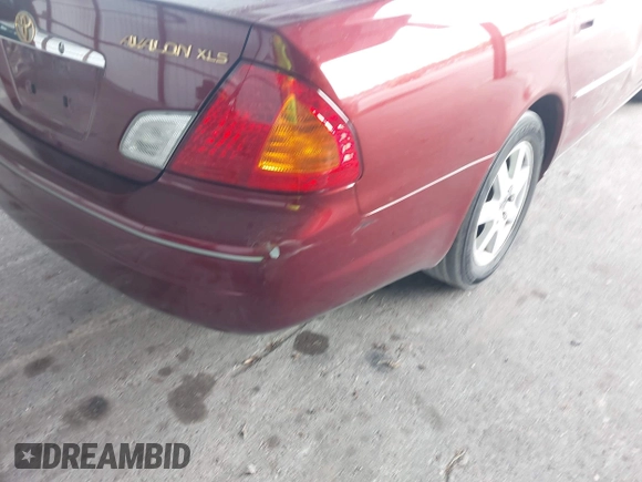 2000 Toyota Avalon XL z VIN 4T1BF28B7YU005222, wystawiony jako IAAI lot #42310903 z przebiegiem 118 700 mil mil oraz . Historia ofert i sprzedaży dostępna na DreamBid. Obrazek 13.